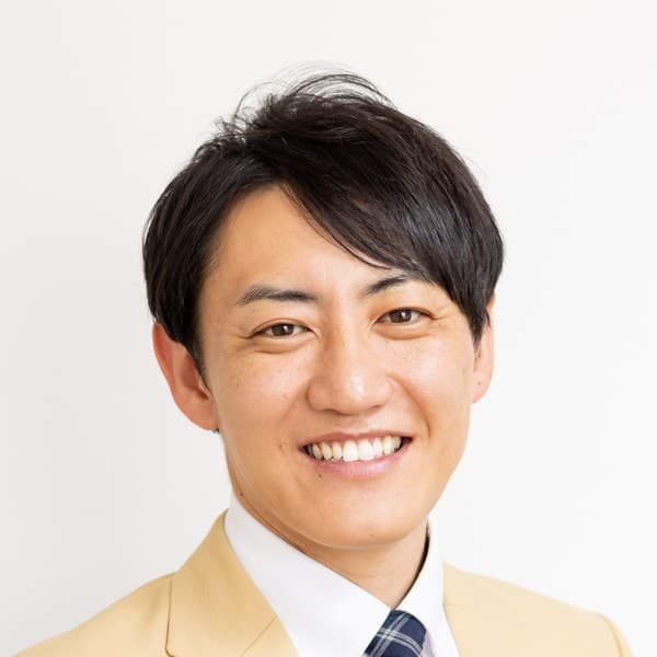 担当者の尾島 雅典